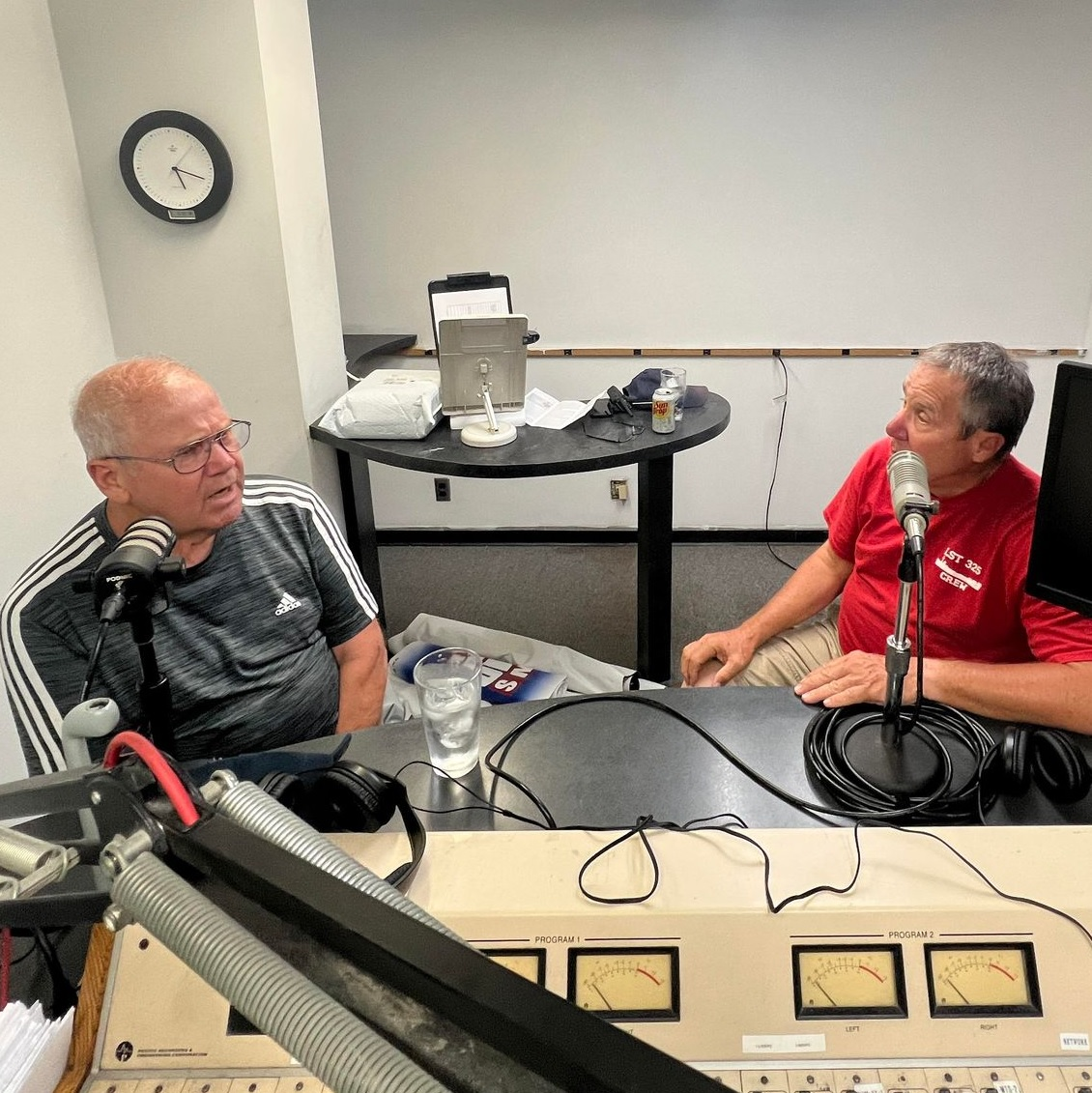 Rick's dad, Rod Solem, a Navy veteran, and Air Force vet Ken Rupp telling stories