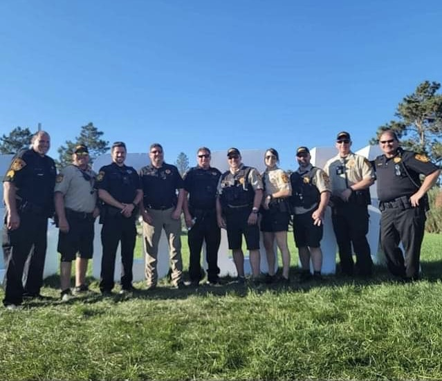 The La Crosse County sheriff's deputy photo flashing the "OK" sign