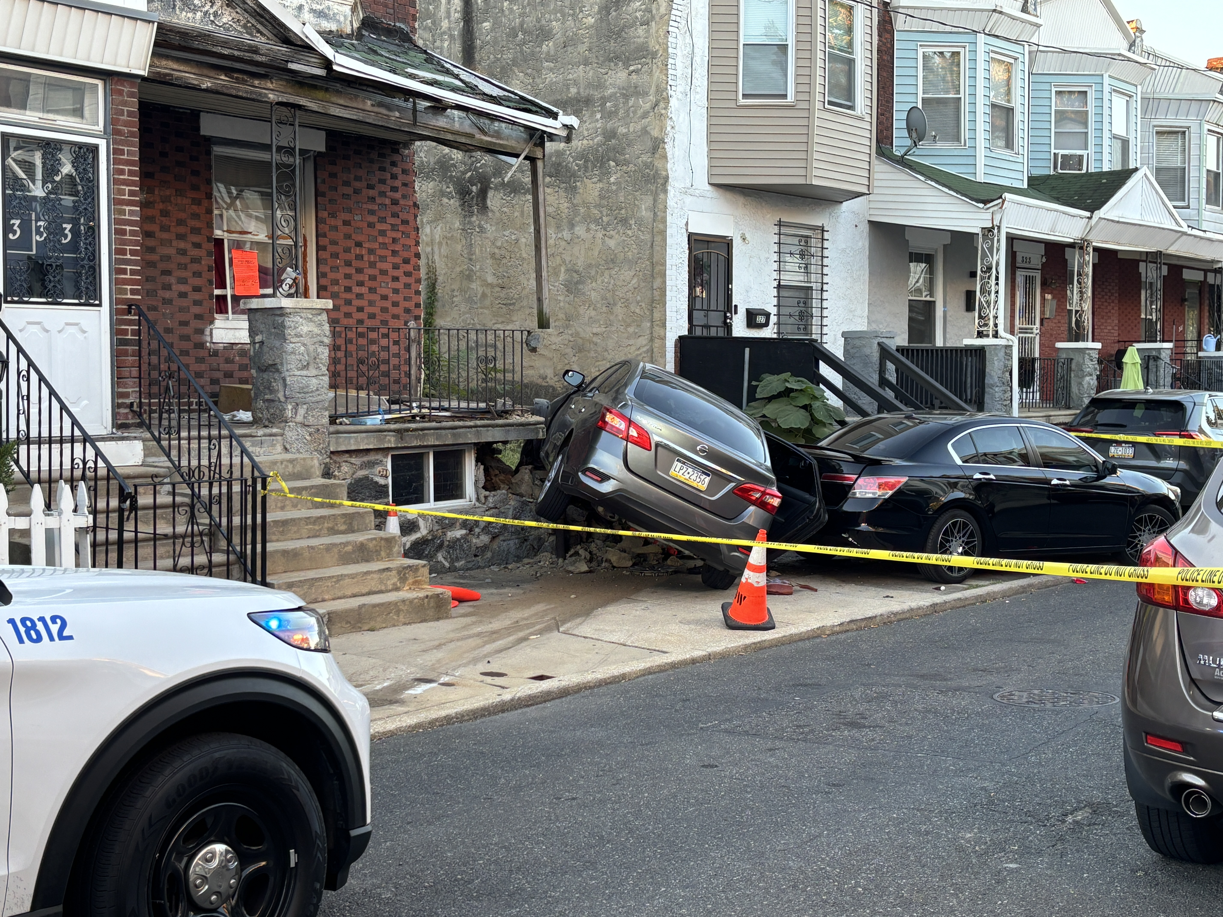 Carjacking suspects crash car into West Philly row home during police pursuit