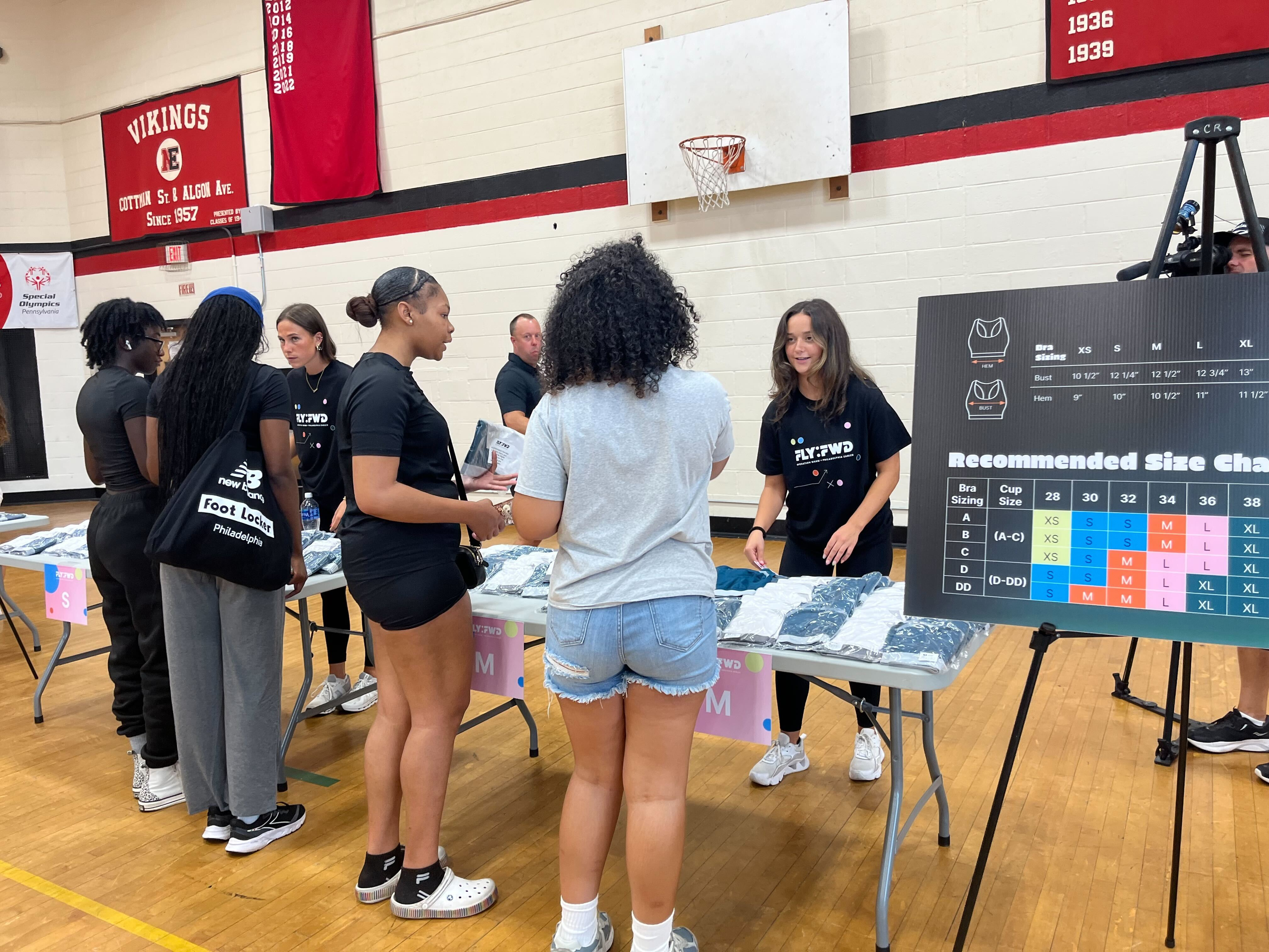 Philadelphia Eagles co-host sports bra distribution event