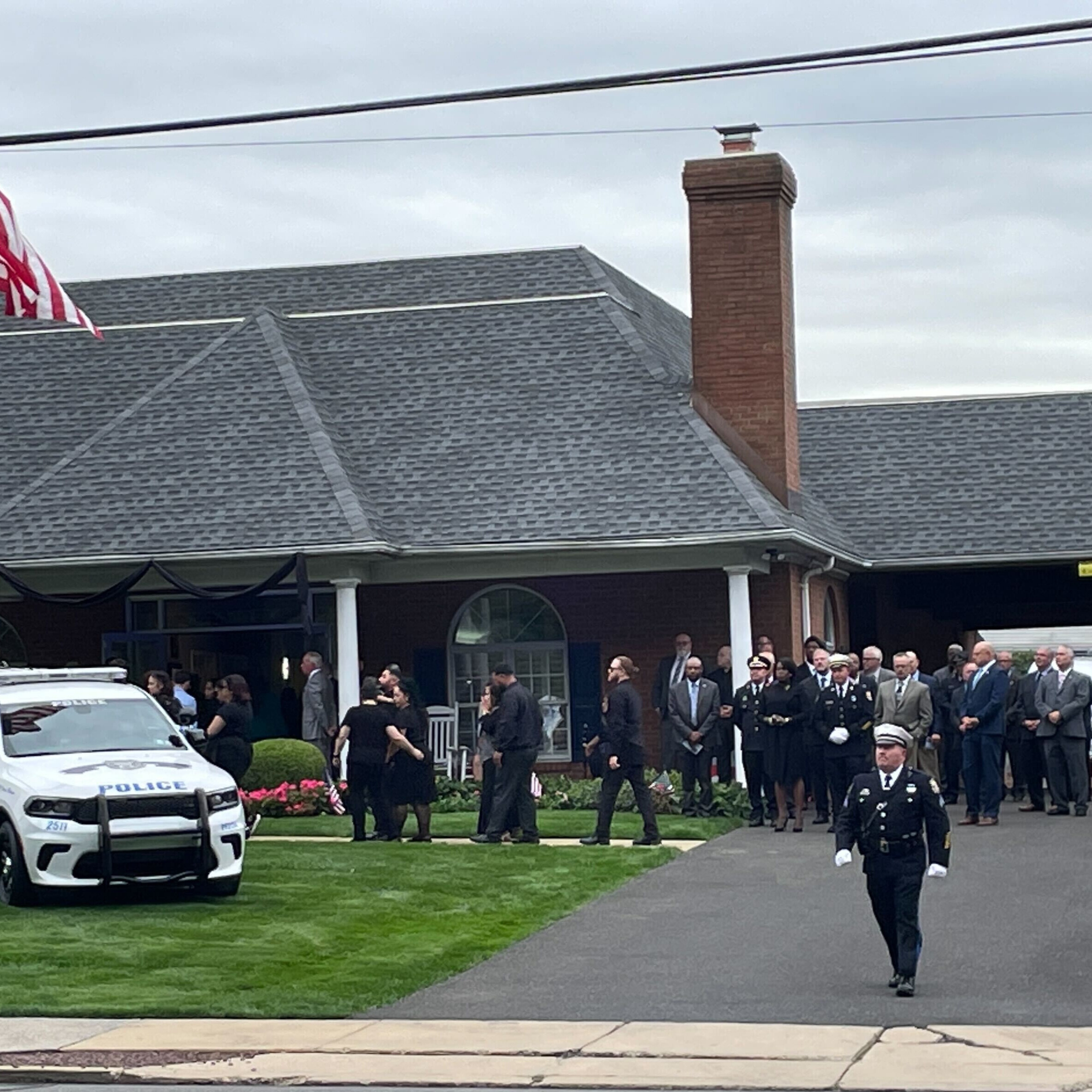 Philadelphia police, public pay respects to Michael Roman's family a day before fallen officer is laid to rest