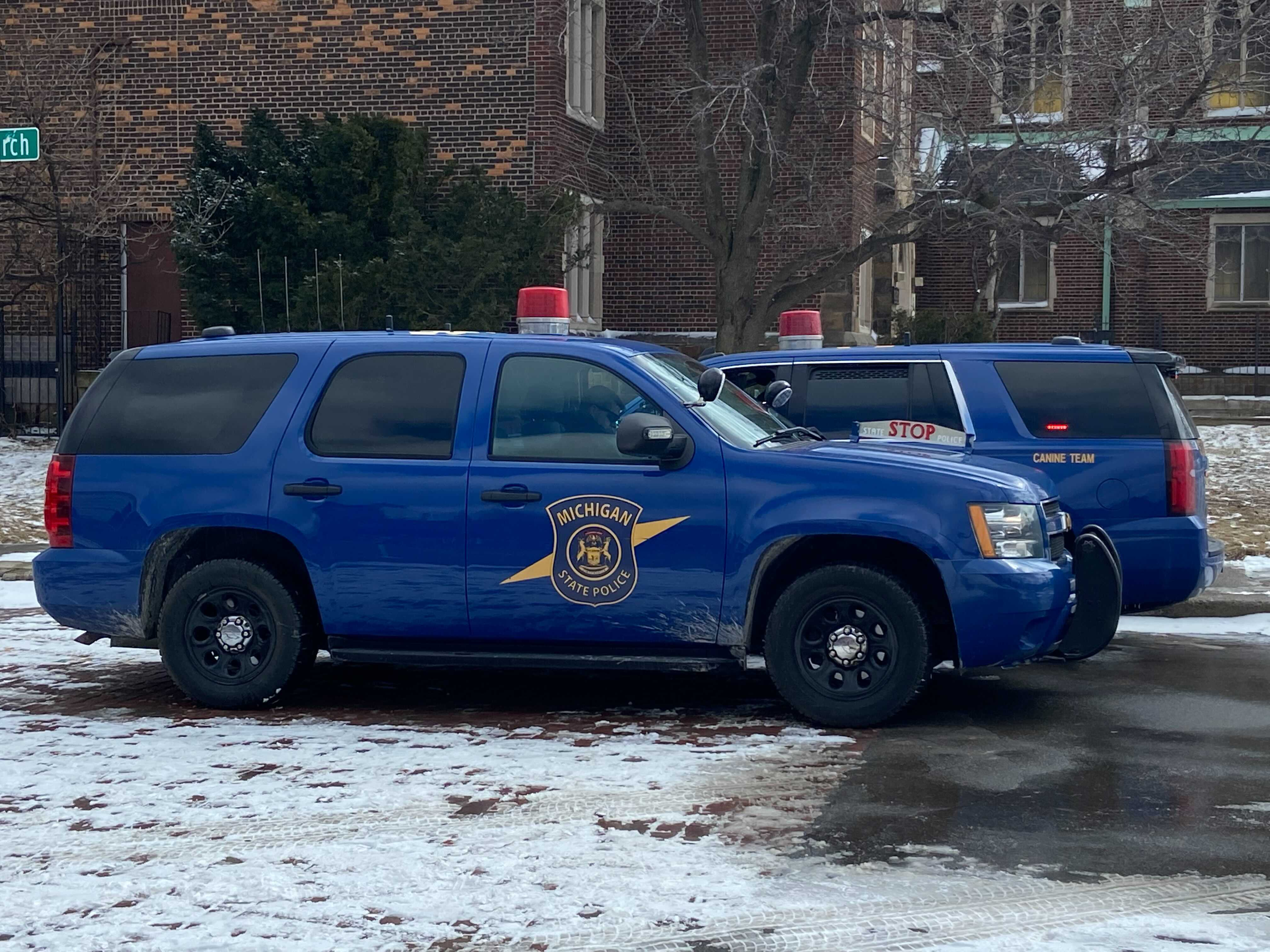 Two Michigan State Police patrol cars involved in separate hit-and-runs Friday morning