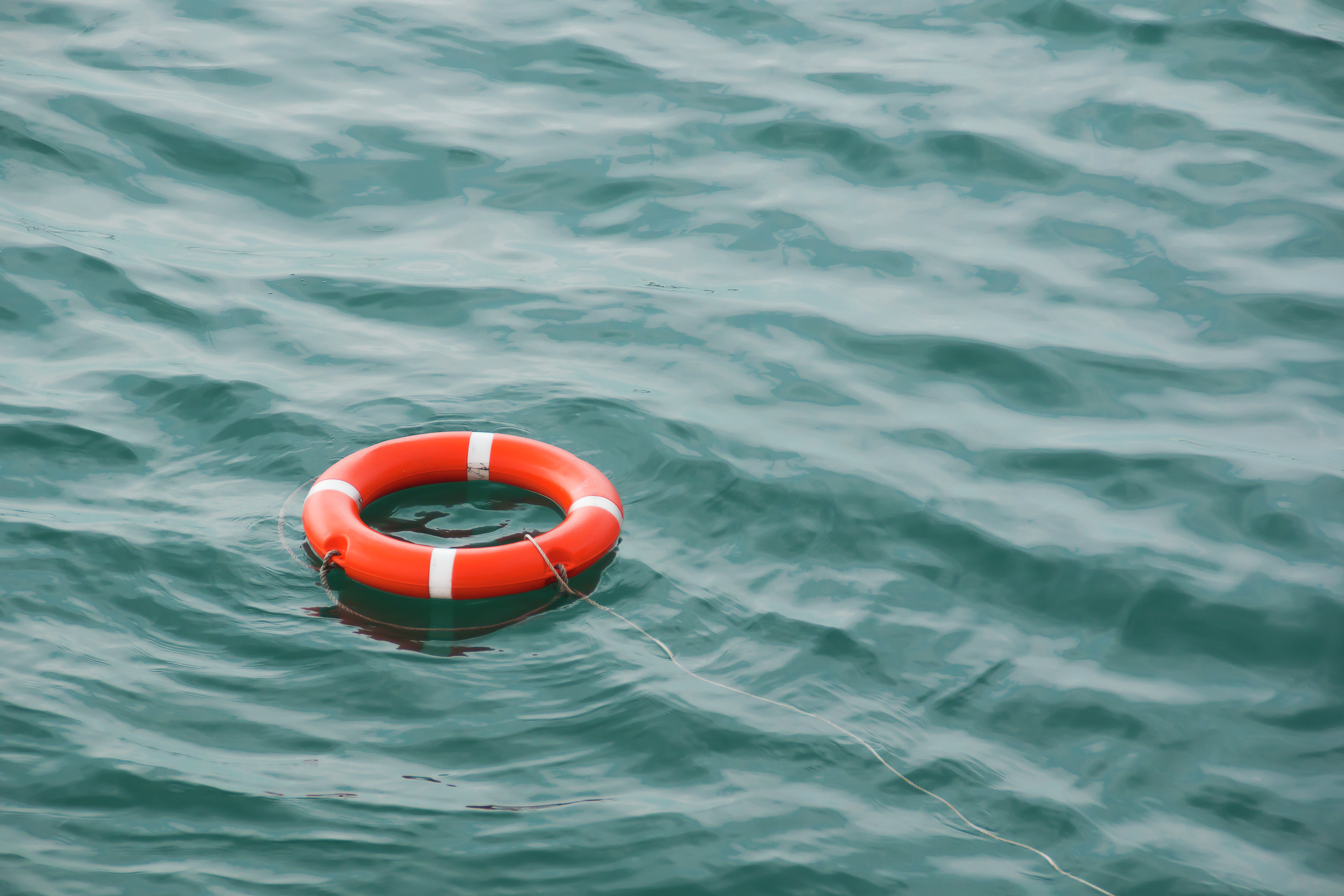 Mail boat rescues man swimming in Detroit River