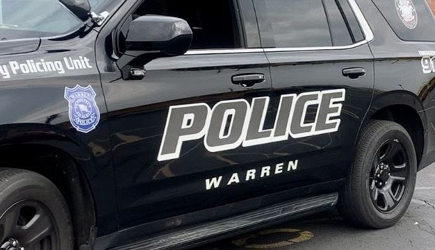 Man dies after being found unconscious in chair inside burning Warren condo