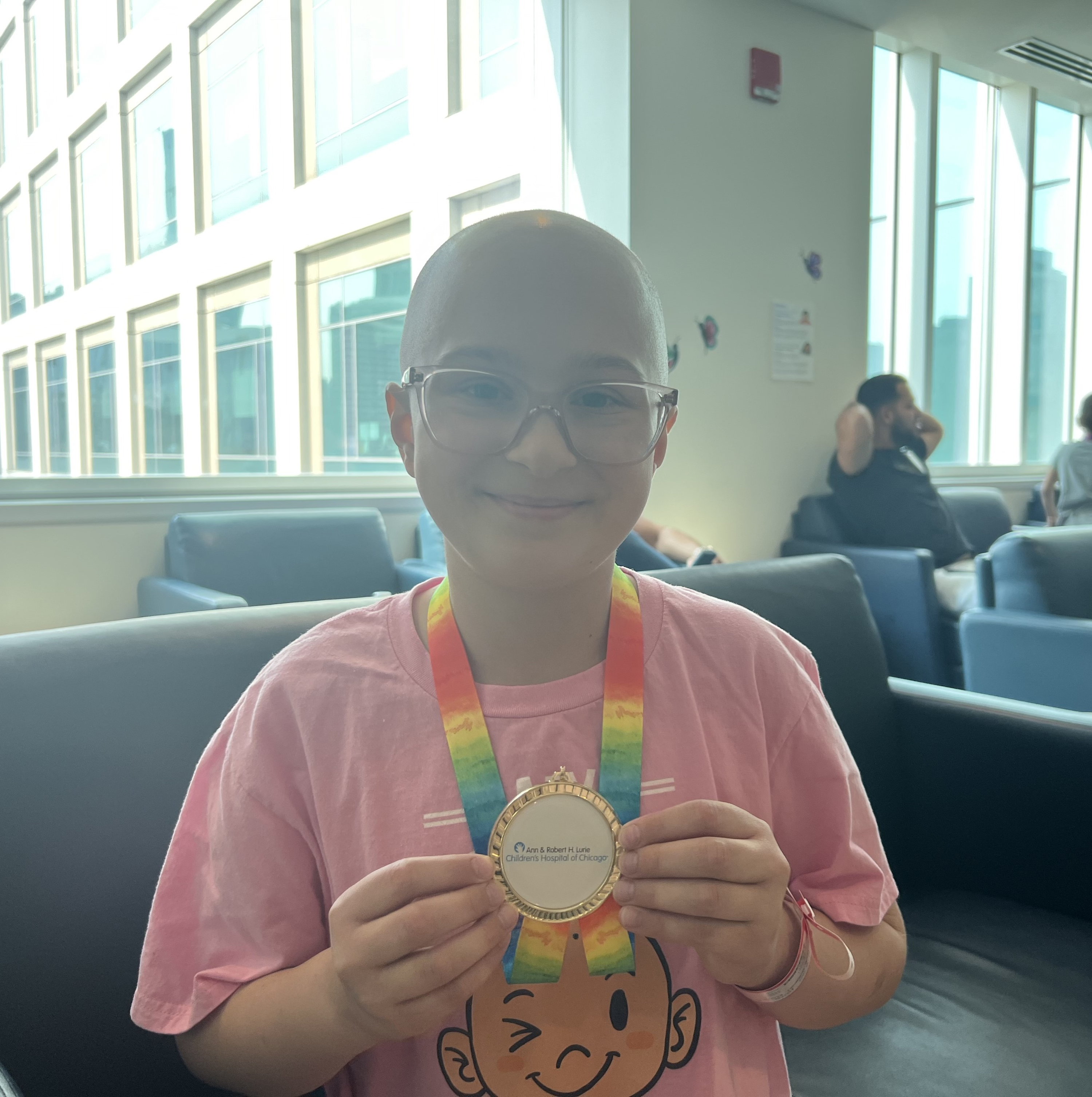 As Olympics continue, patients at Lurie receive medals of their own