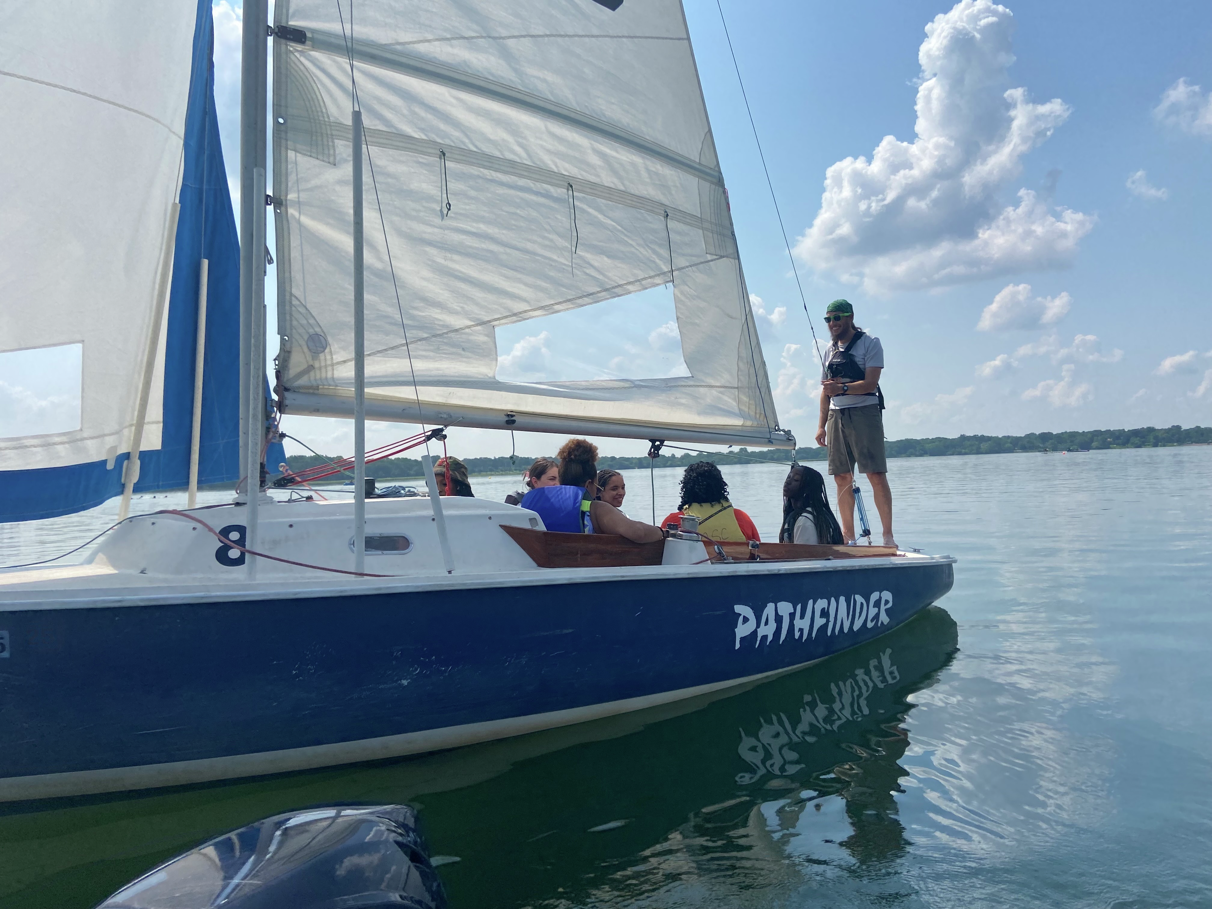 Young North Minneapolis girls get a sailing lesson on Bde Maka Ska