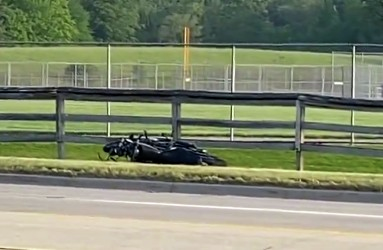 One dead after motorcycle crash along Eight Mile in Farmington Hills,  search continues for prisoner who escaped from hospital