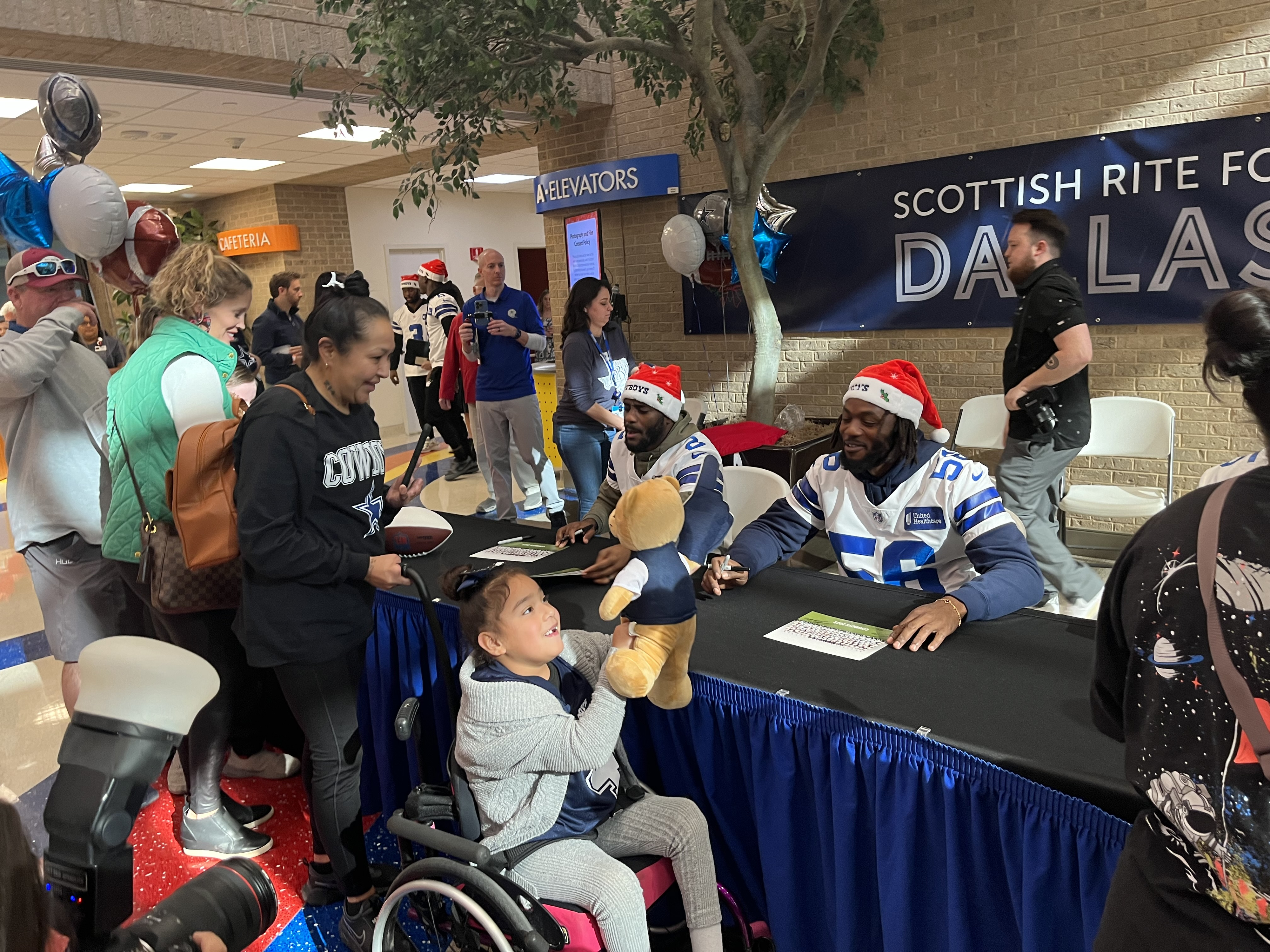 Dallas Cowboys visit patients at Scottish Rite for Children