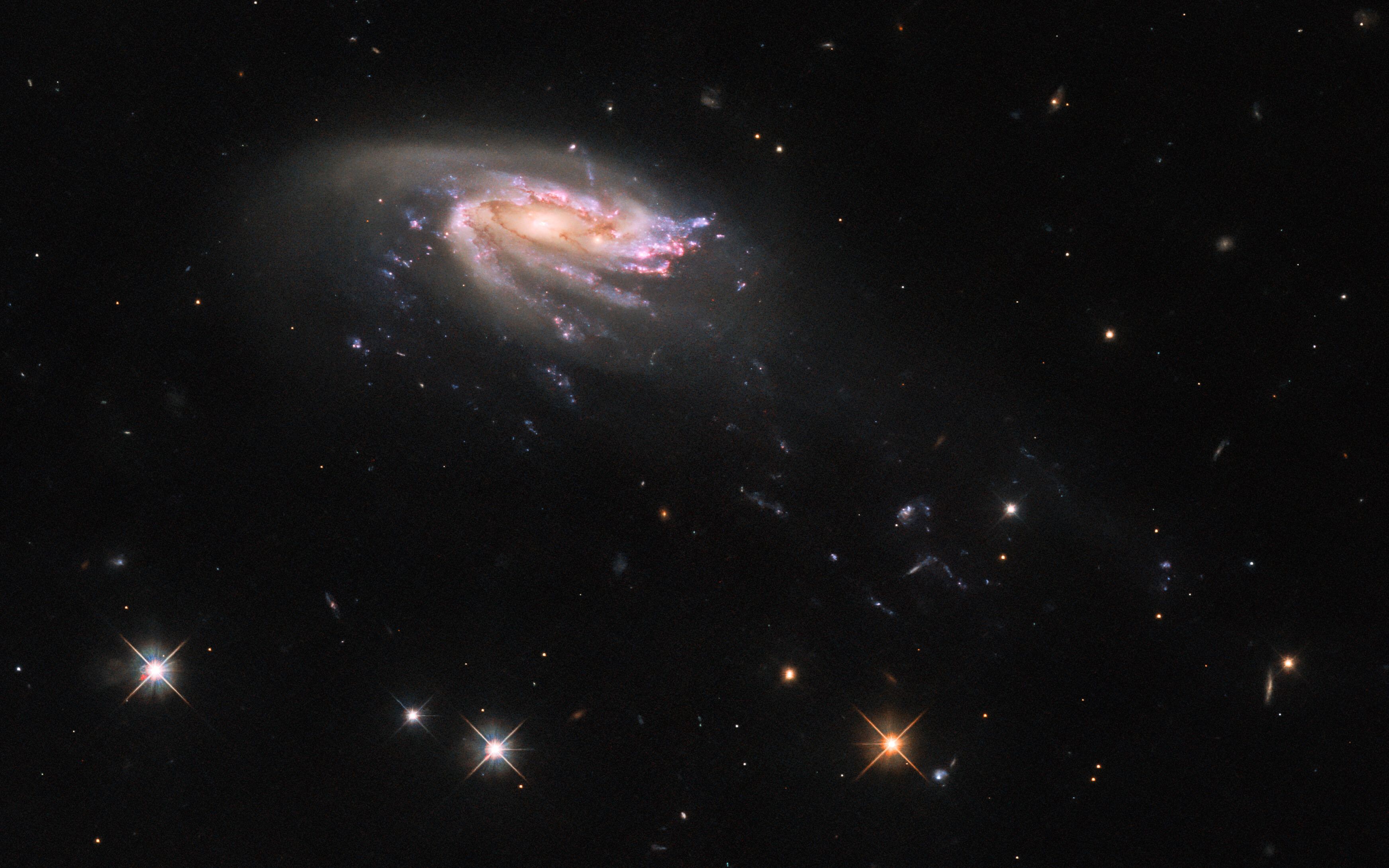 Hubble discovers stunning jellyfish galaxy 'swimming' through a sea of stars