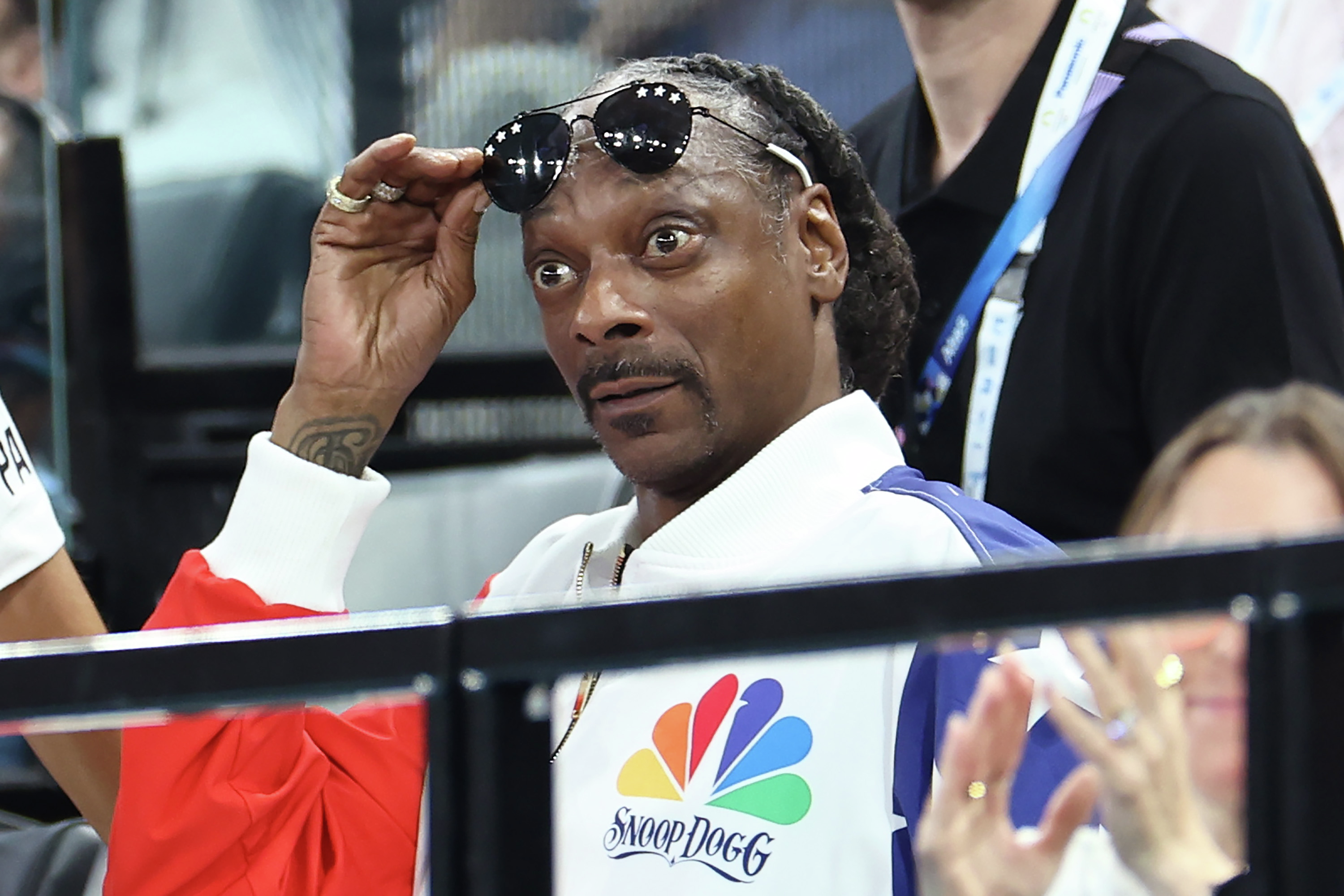 Former Olympian from Newport Beach attends Olympics, meets Snoop Dogg