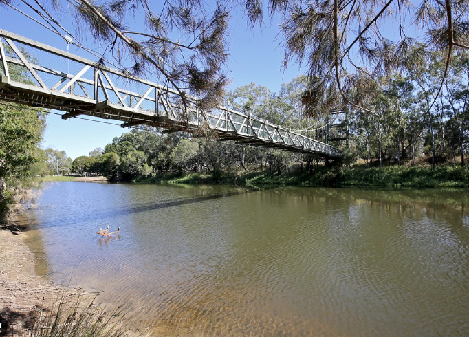 Car retrieved from local river, occupants yet to be found