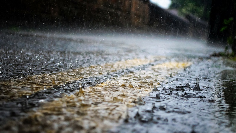 Car caught in flood waters during wild weather