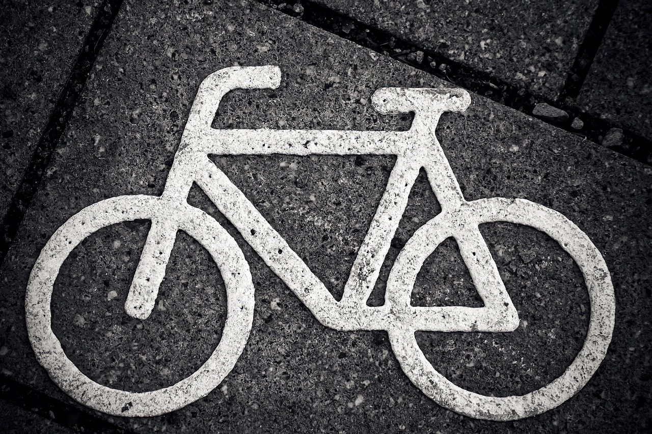 Cyclist avoids injury after being struck by car