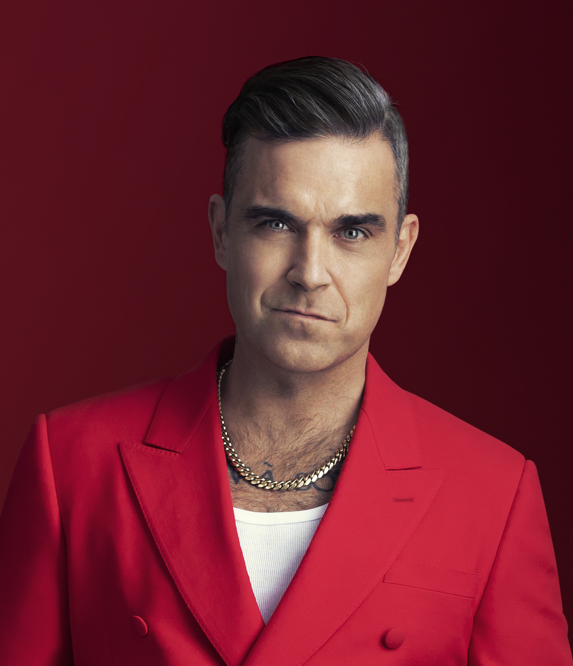 Robbie Williams Talks Better Man, A Sequel, His Dad & Kids Reactions & What Didn’t Make the Film