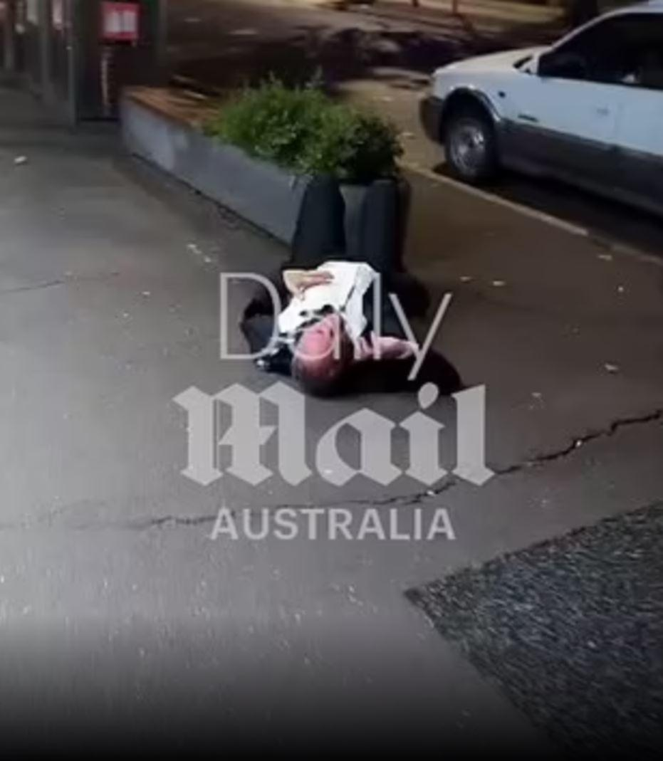 Barnaby Joyce 'embarrassed', captured laying on Canberra footpath