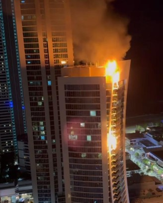 Woman eating kebab at 2am watches Hilton fire unfold from balcony