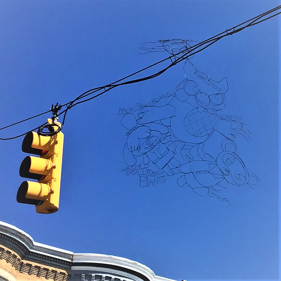 Who’s behind those wire sculptures dangling on traffic lights?