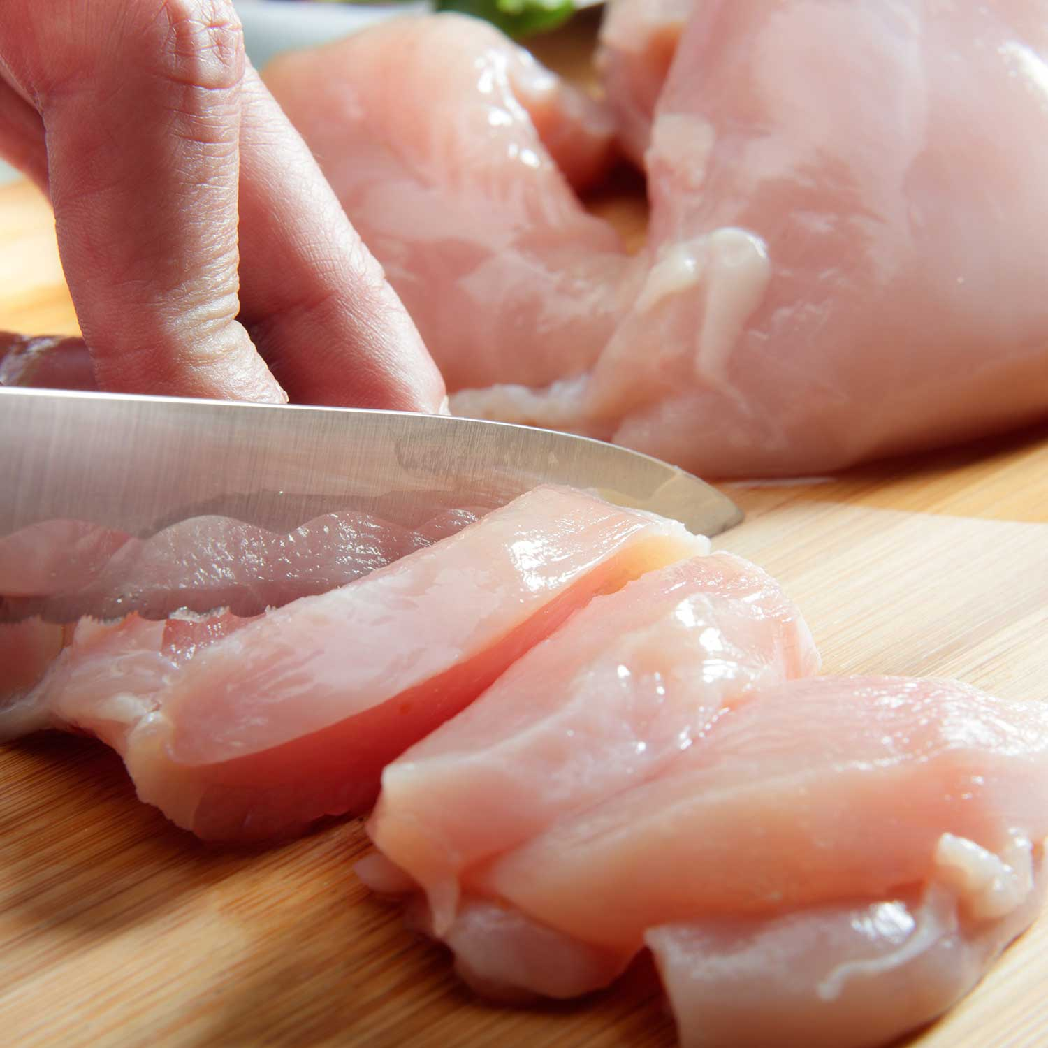 The reason there is 'no point' washing raw chicken before cooking