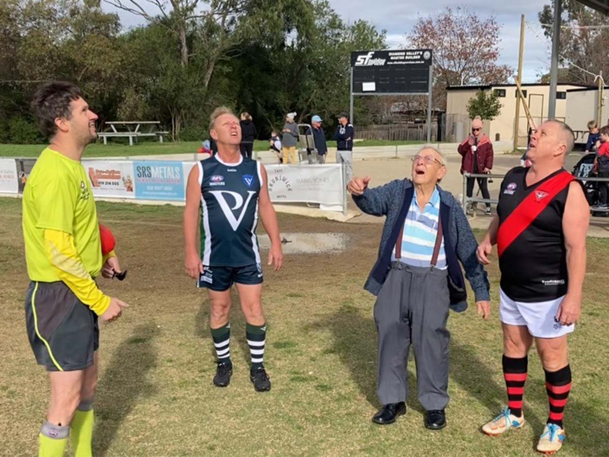 What a moment! 90-year-old dad tosses coin at sons' football game