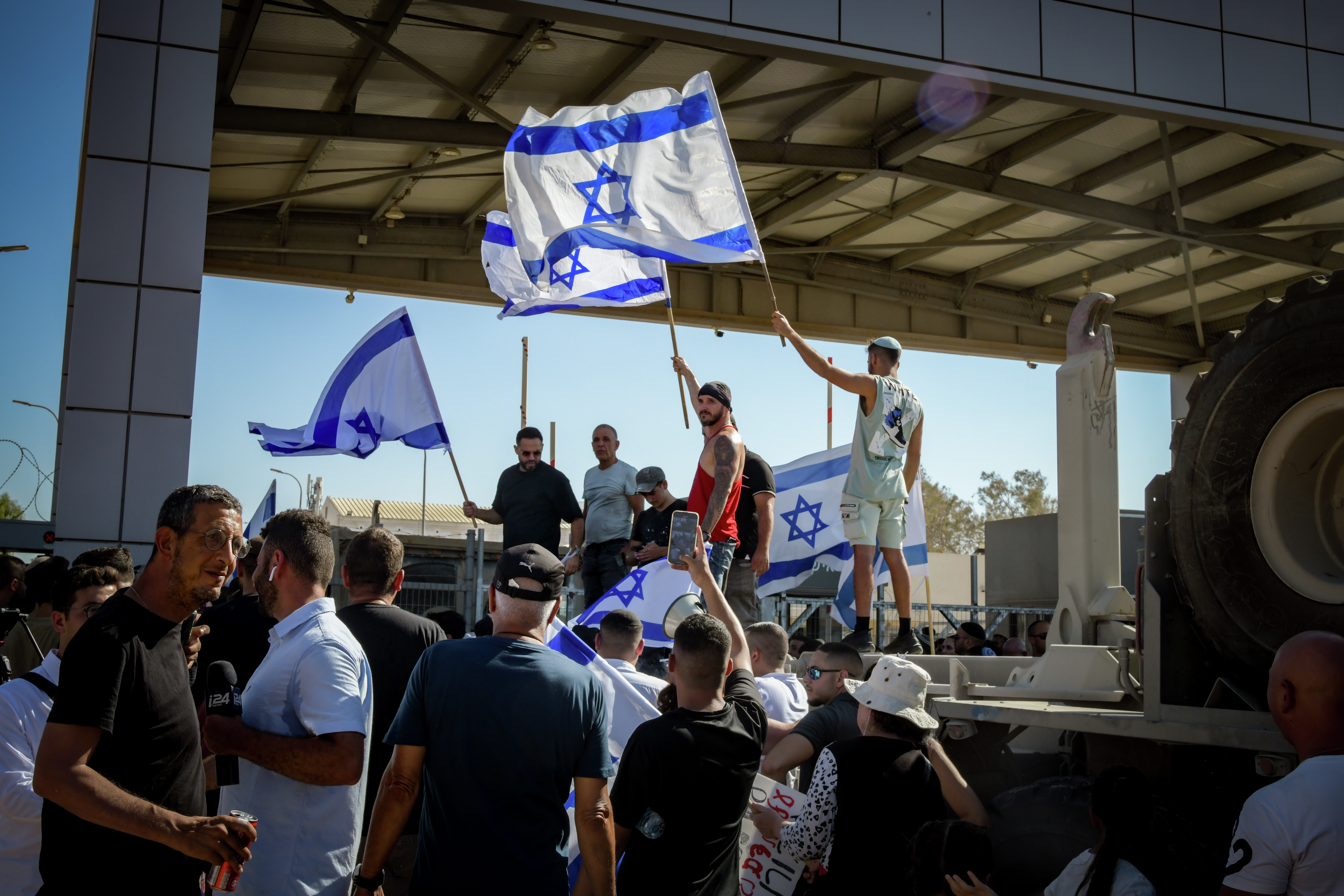 Day 298 - Israel's 'January 6' moment? Mobs overrun 2 IDF bases - podcast episode cover