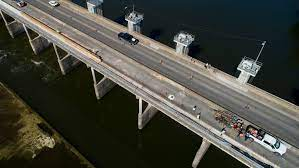 Weather slows welcome fixes to Longhorn Dam pedestrian bridge, but project on schedule