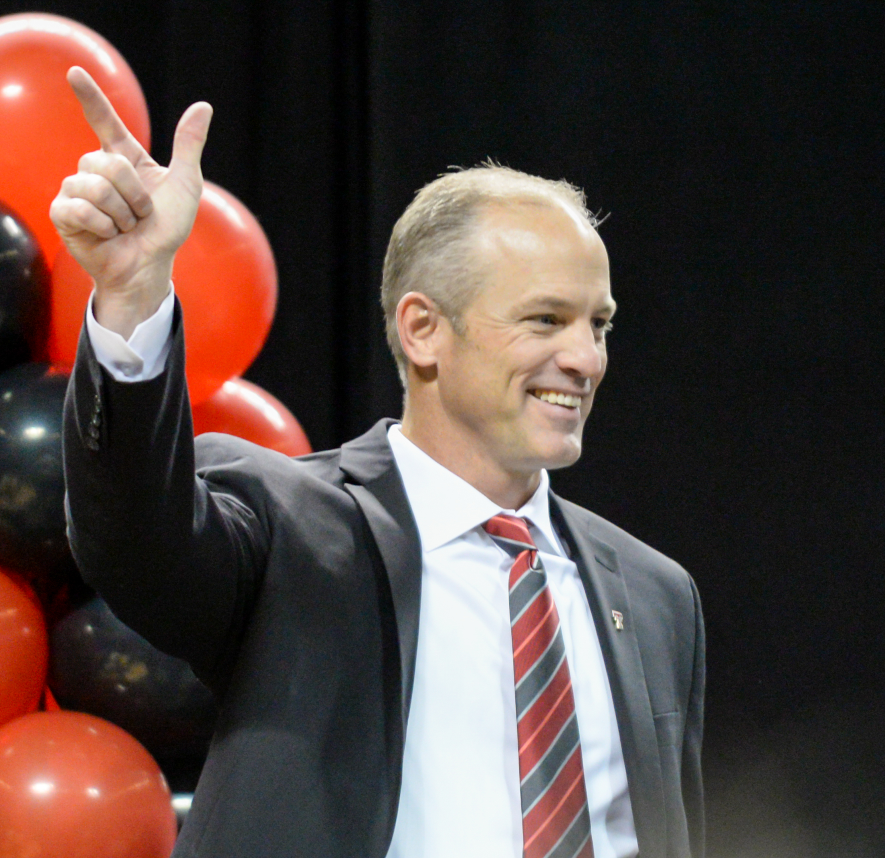 Texas Tech football coach Matt Wells speaks to fans and the media as he's introduced Saturday inside United Supermarkets Arena