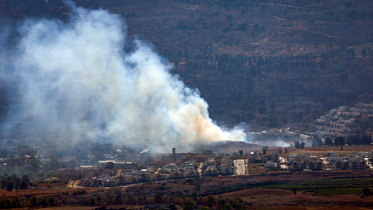 Hezbollah launches barrage of rockets at Israel following commander's killing