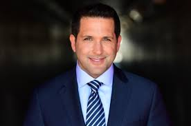 ADAM SCHEFTER